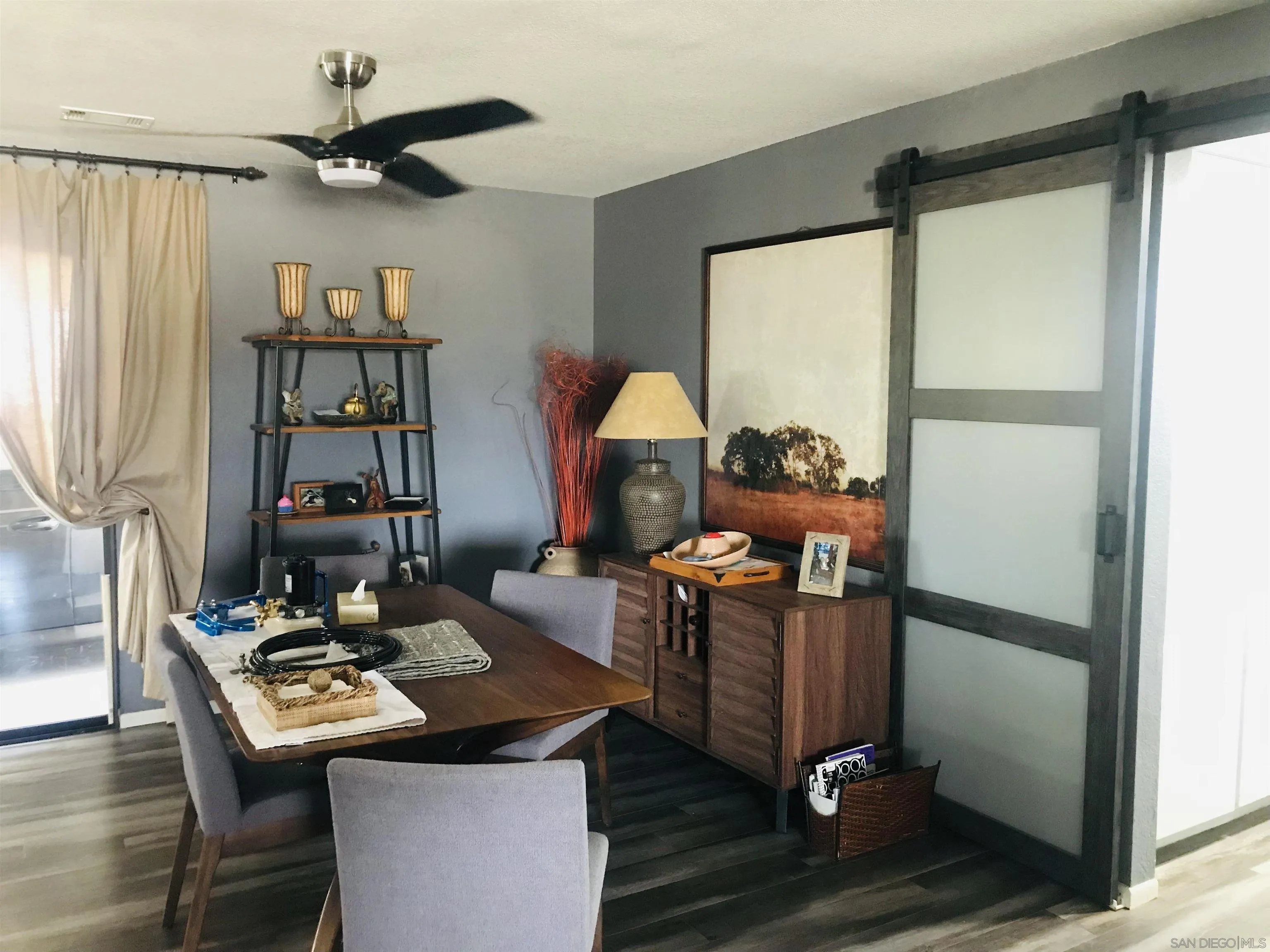 14665 Hopi Road Apple Valley, CA 92307 - Photo 17 of 21 a living room with furniture and a window