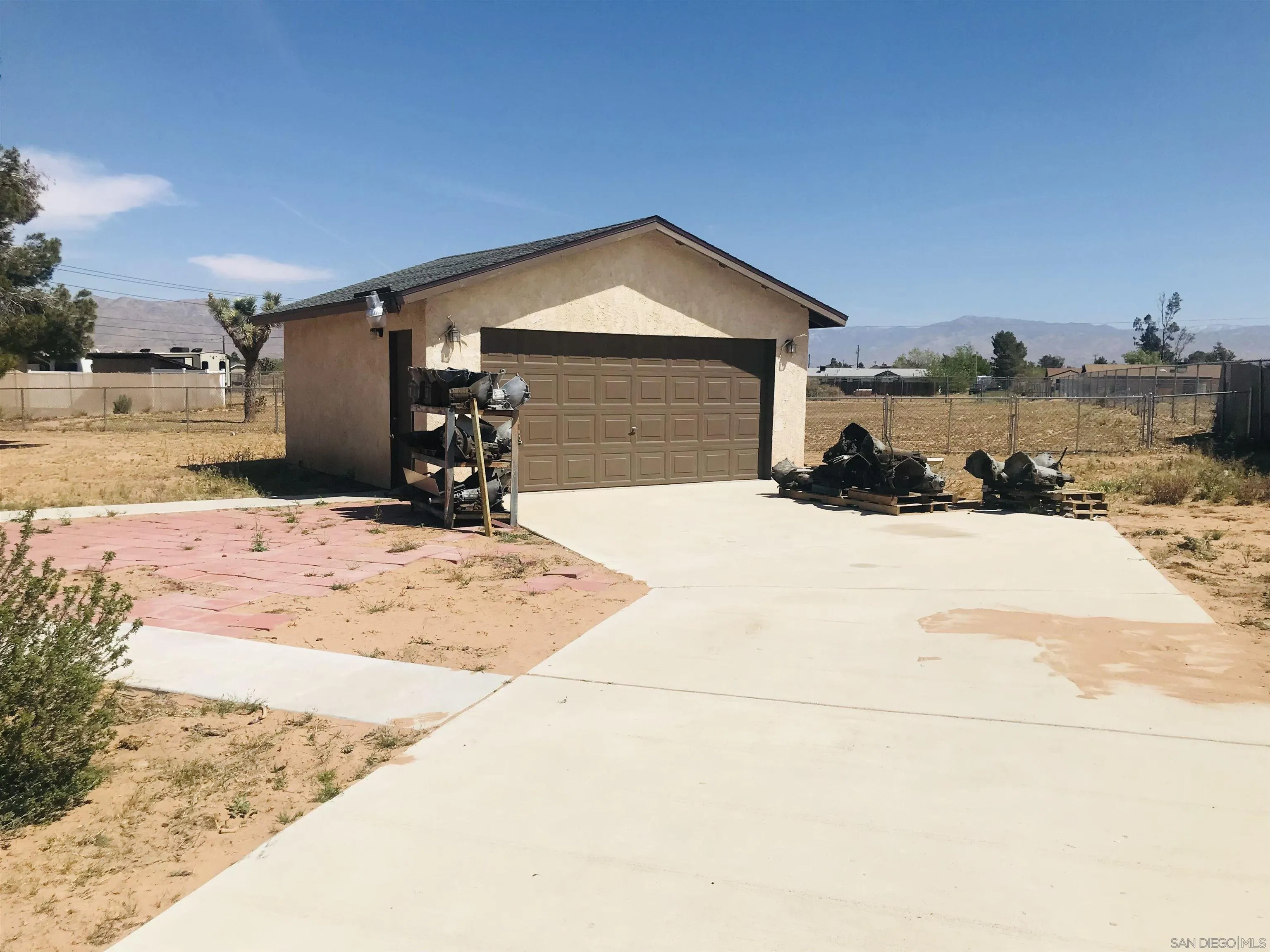 14665 Hopi Road Apple Valley, CA 92307 - Photo 5 of 21 a view of a house with snow in the background