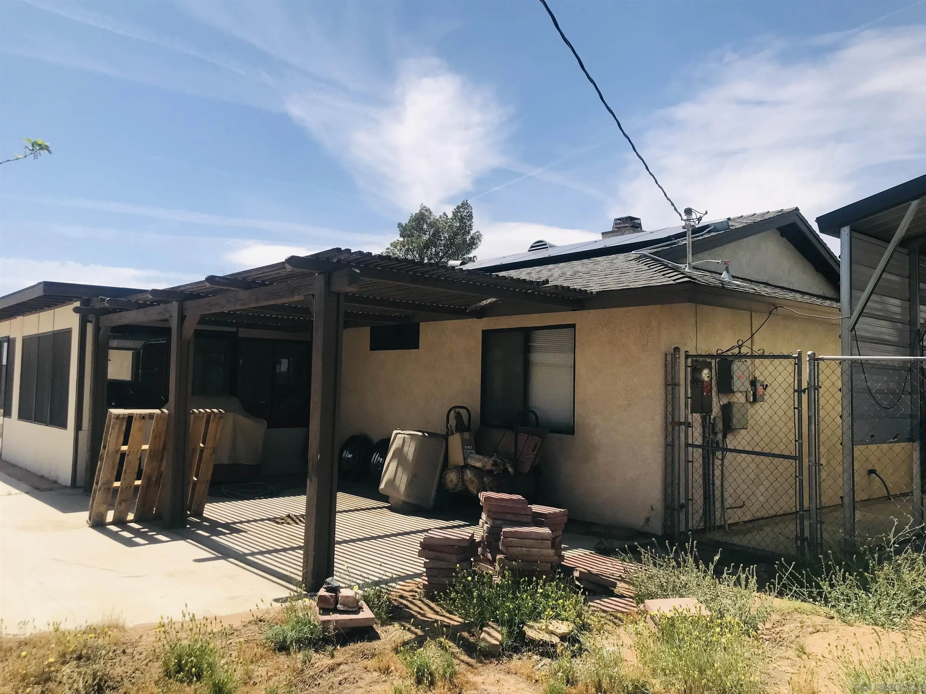14665 Hopi Road Apple Valley, CA 92307 - Photo 10 of 21 a front view of a house