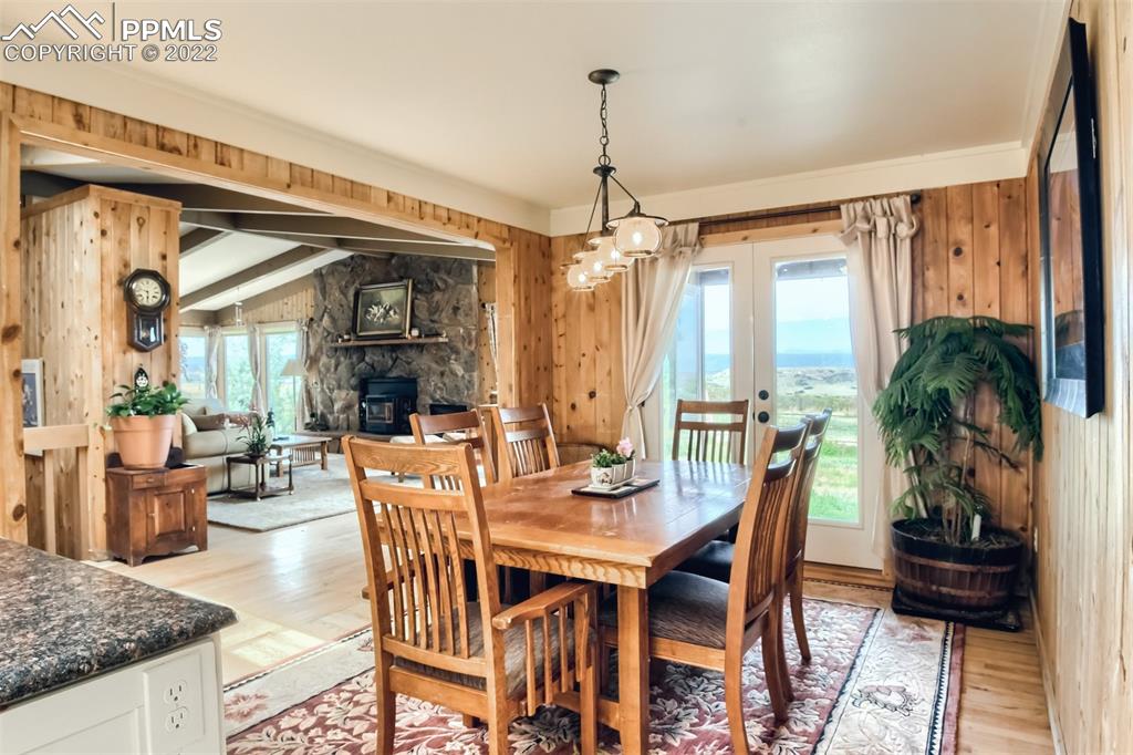 1245 South Ridge Road Castle Rock, CO 80104 - Photo 14 of 39 a view of a dining room with furniture window and outside view