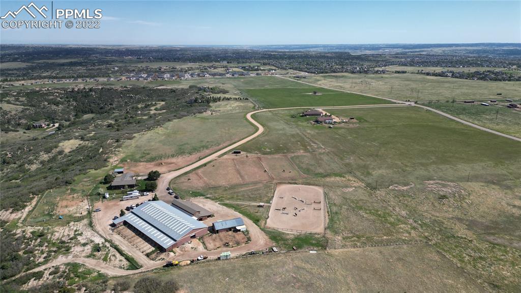 1245 South Ridge Road Castle Rock, CO 80104 - Photo 28 of 39 an aerial view of a house with outdoor space