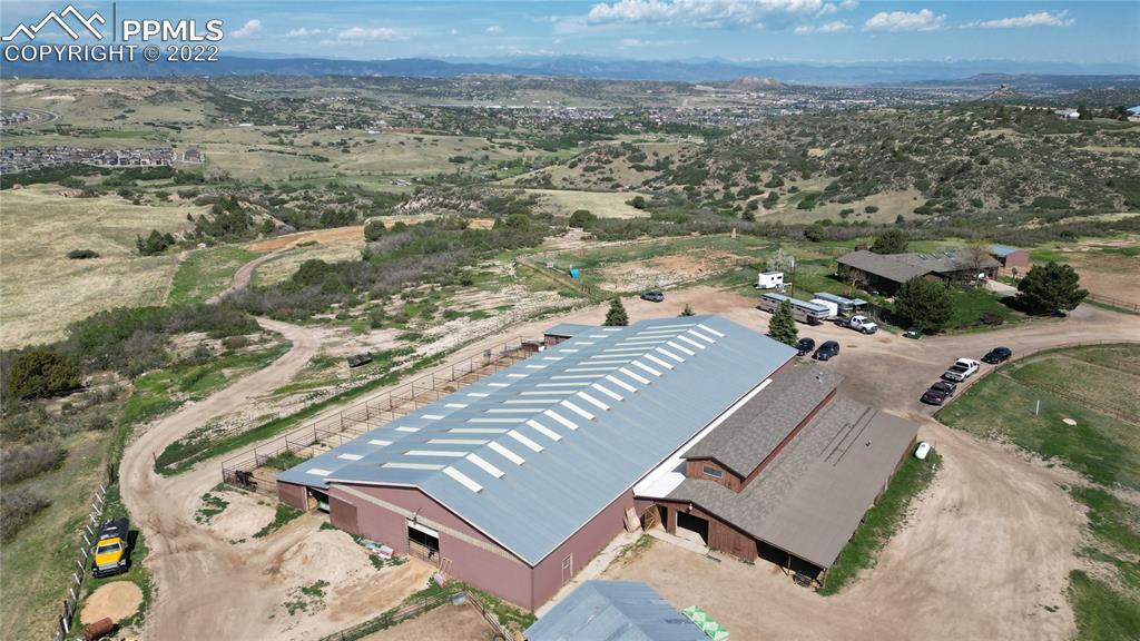 1245 South Ridge Road Castle Rock, CO 80104 - Photo 32 of 39 an aerial view of residential houses with outdoor space