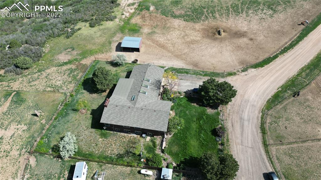 1245 South Ridge Road Castle Rock, CO 80104 - Photo 33 of 39 an aerial view of a house with outdoor space