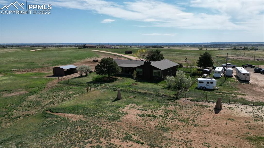 1245 South Ridge Road Castle Rock, CO 80104 - Photo 35 of 39 a view of a lake with outdoor space
