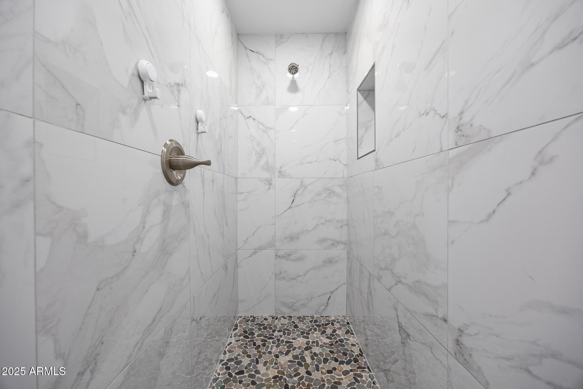 30826 North Crozier Road Wittmann, AZ 85361 - Photo 27 of 65 a bathroom with a shower