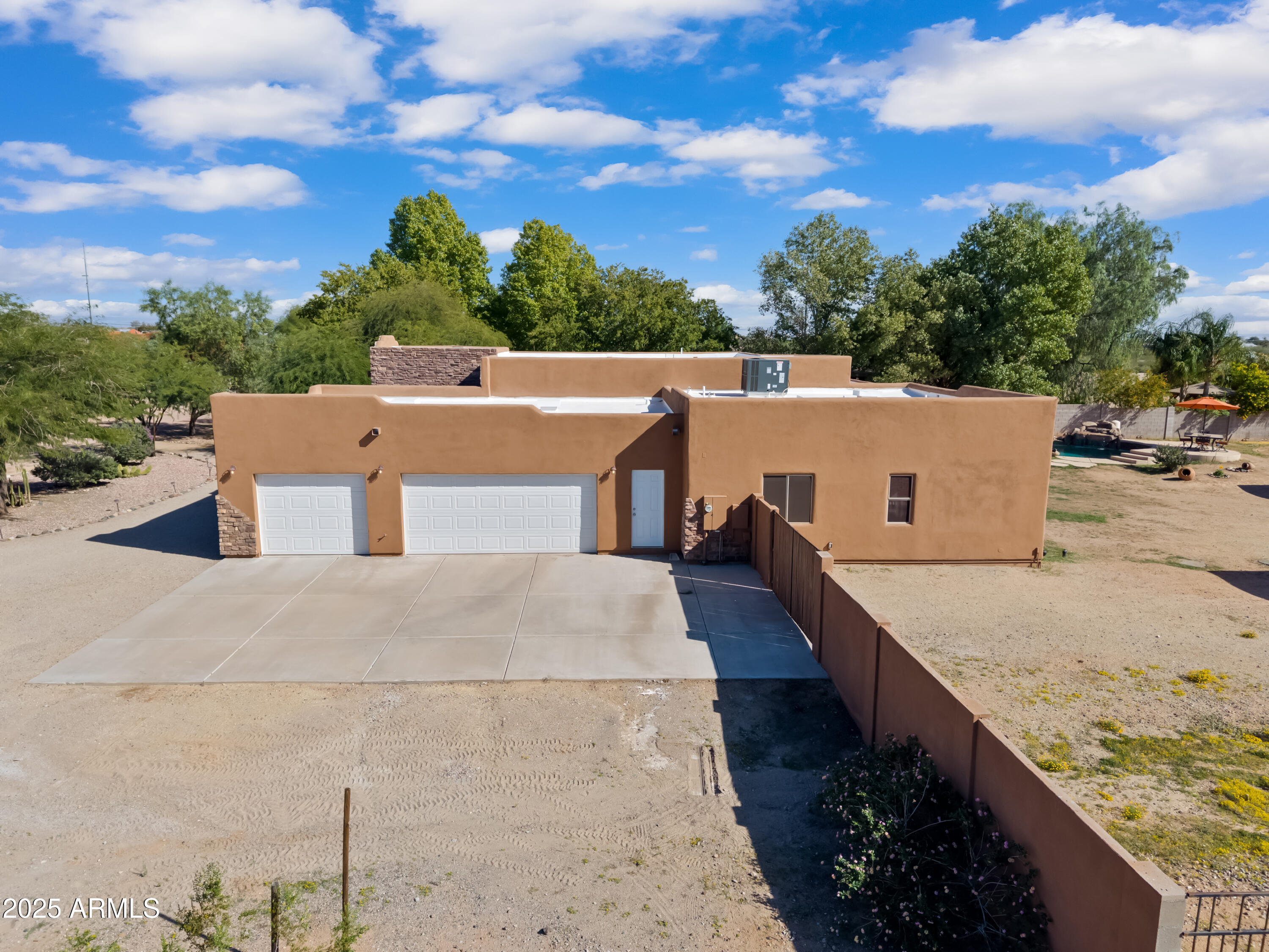 30826 North Crozier Road Wittmann, AZ 85361 - Photo 3 of 65 a view of a house with a terrace