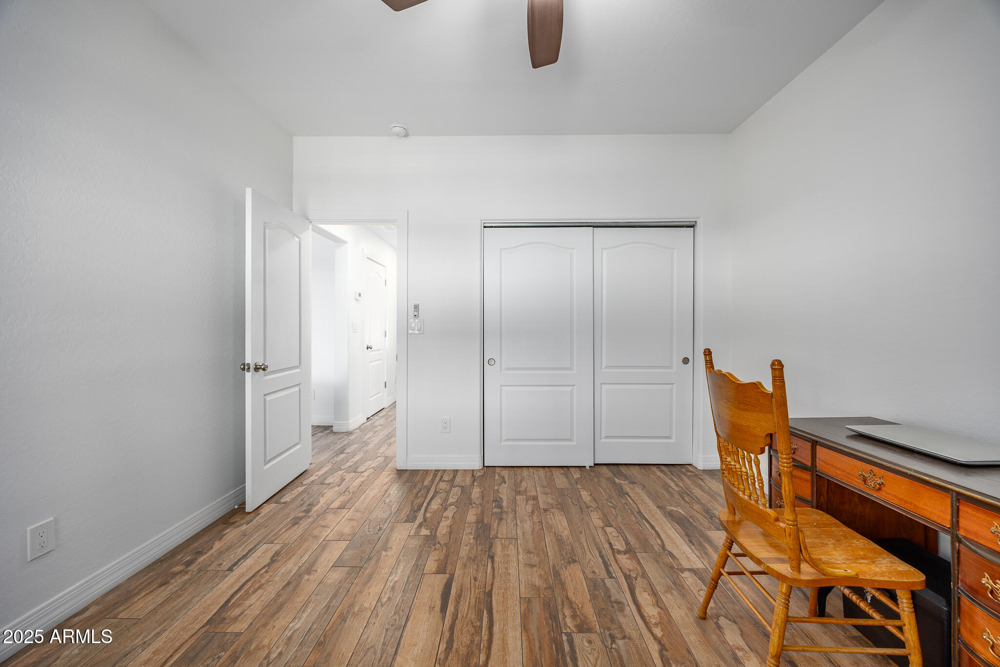30826 North Crozier Road Wittmann, AZ 85361 - Photo 35 of 65 a view of a room with wooden floor