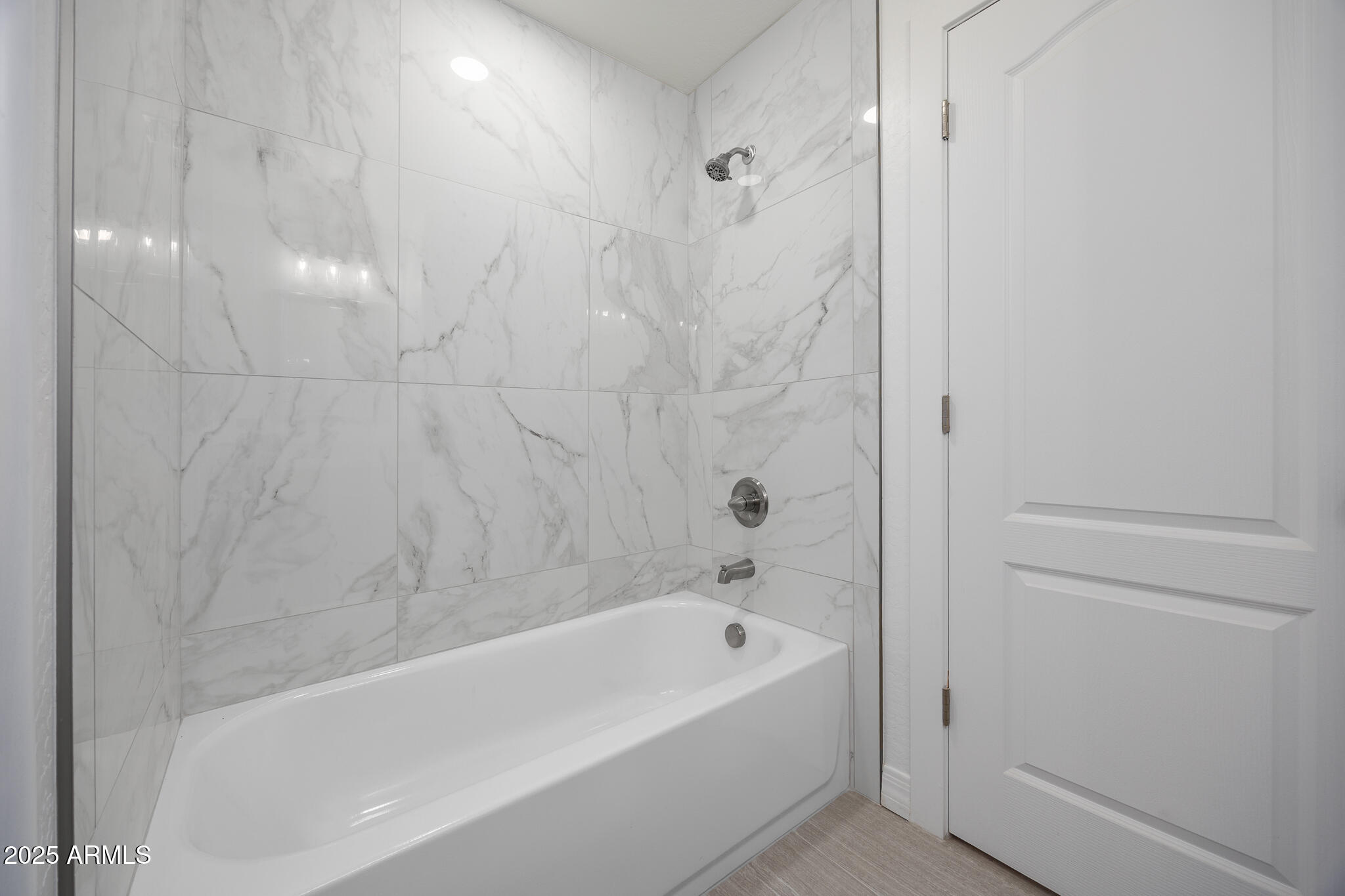 30826 North Crozier Road Wittmann, AZ 85361 - Photo 41 of 65 a bathroom with a bathtub and shower