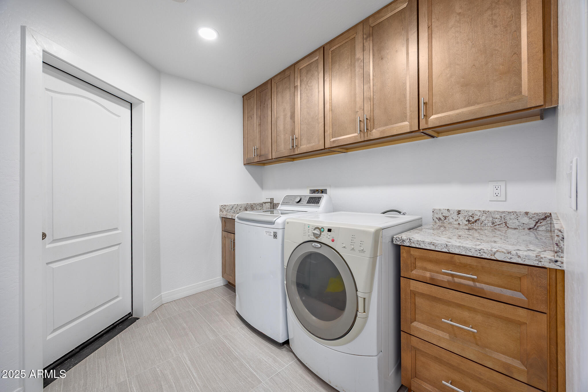 30826 North Crozier Road Wittmann, AZ 85361 - Photo 43 of 65 a utility room with dryer and washer