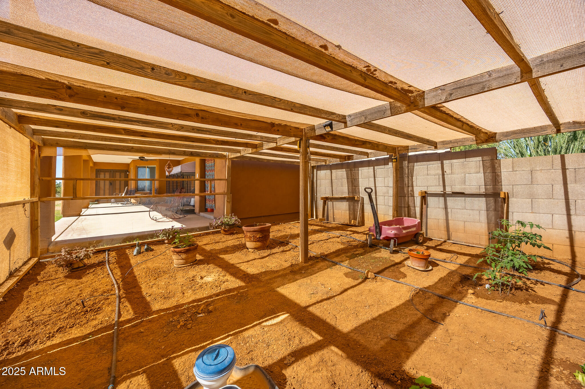 30826 North Crozier Road Wittmann, AZ 85361 - Photo 45 of 65 a view of a patio with a table and chairs