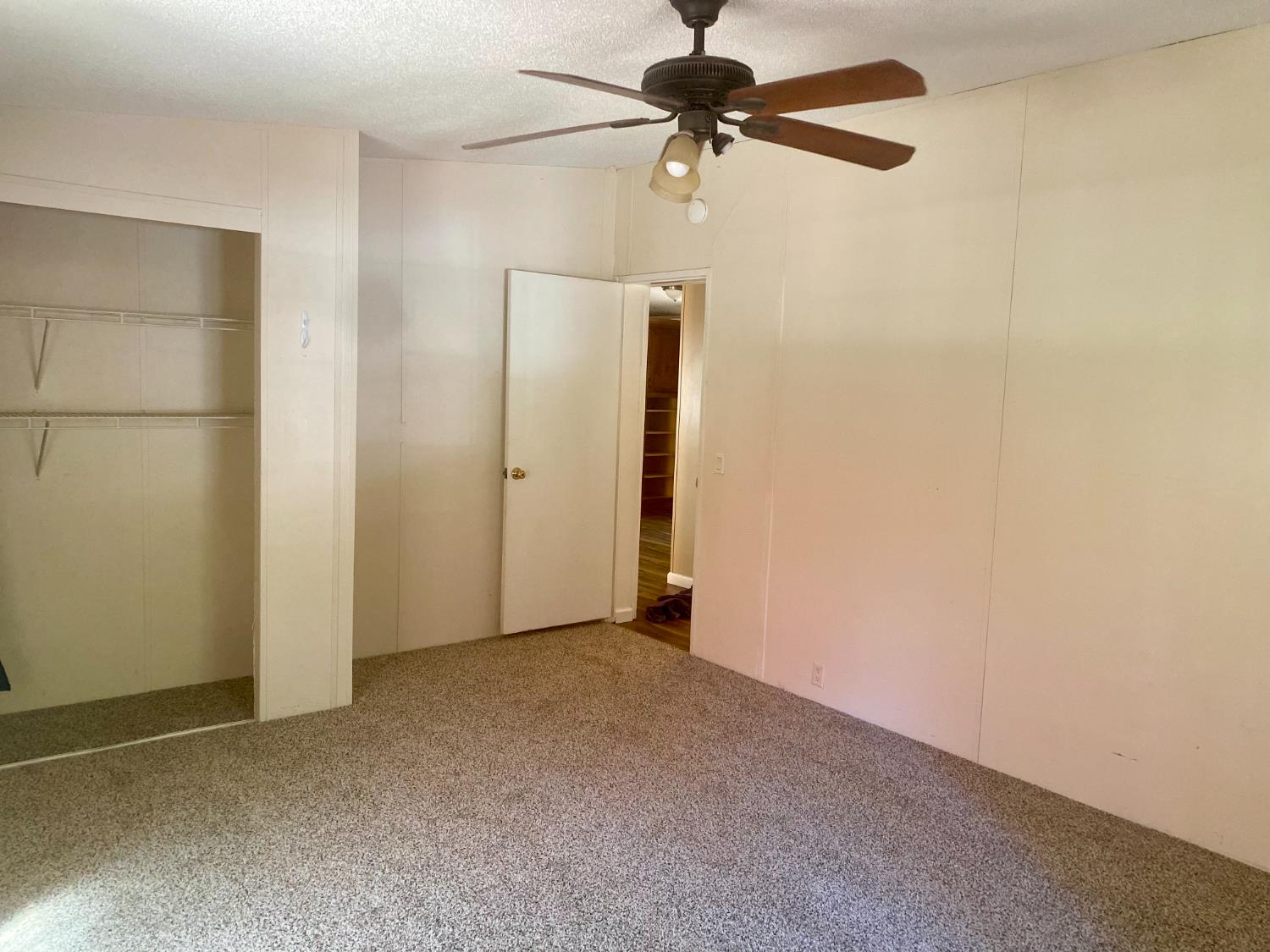 31004 Relief Hill Road, Unit 3 Nevada City, CA 95959 - Photo 14 of 31 an empty room with a empty space and a ceiling fan