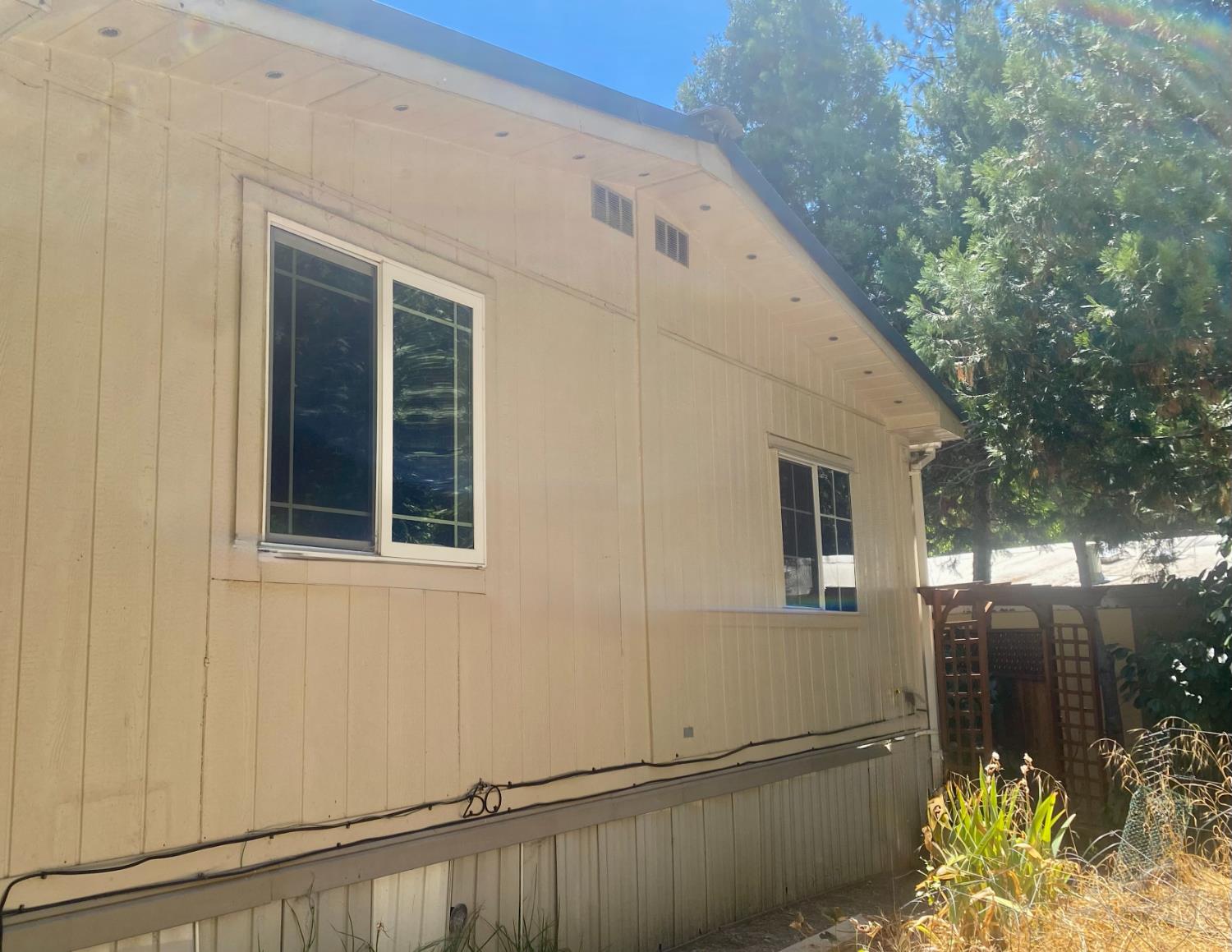 31004 Relief Hill Road, Unit 3 Nevada City, CA 95959 - Photo 21 of 31 front view of a house with a yard