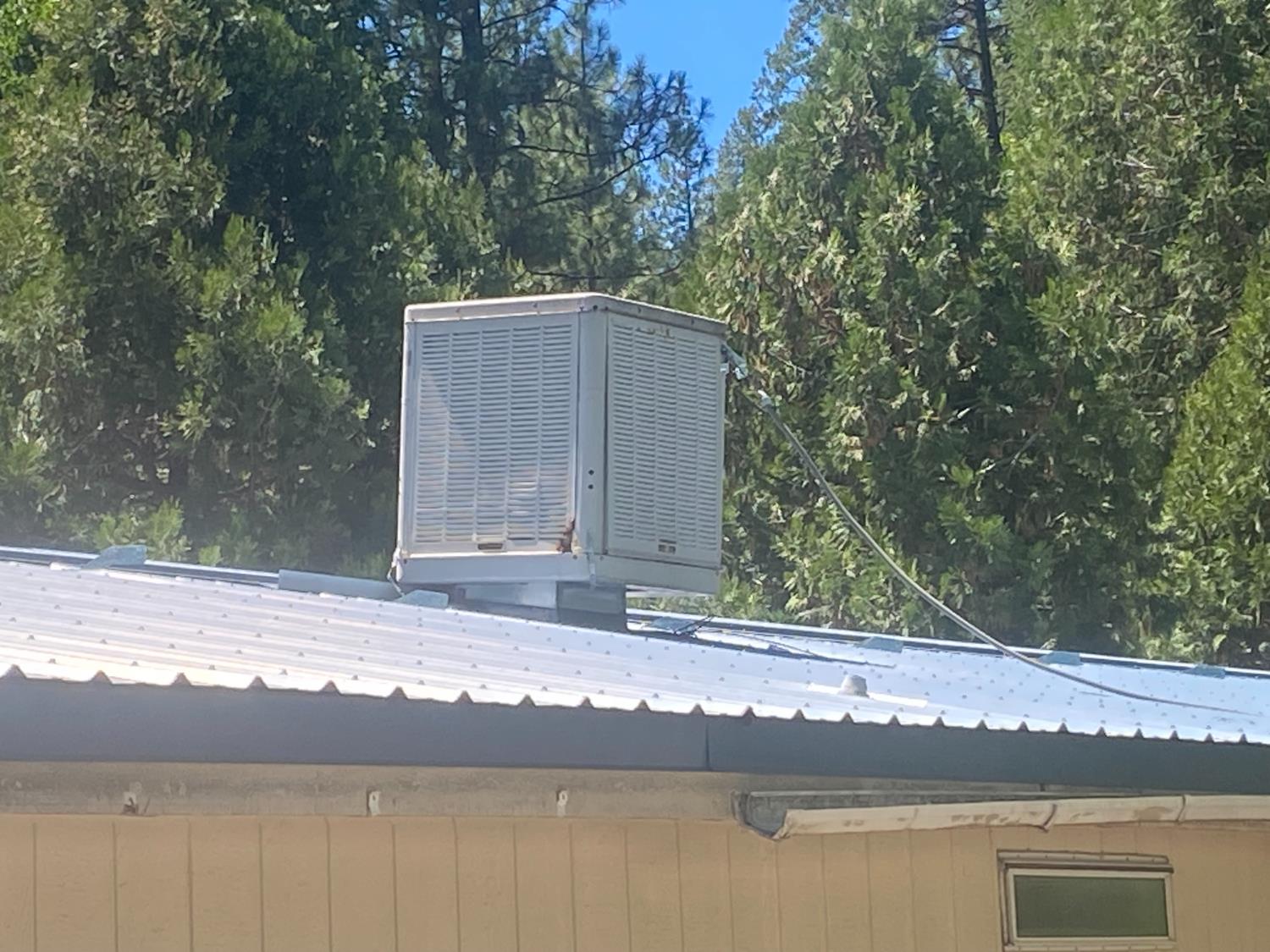 31004 Relief Hill Road, Unit 3 Nevada City, CA 95959 - Photo 23 of 31 a view of a house with a yard and sitting area