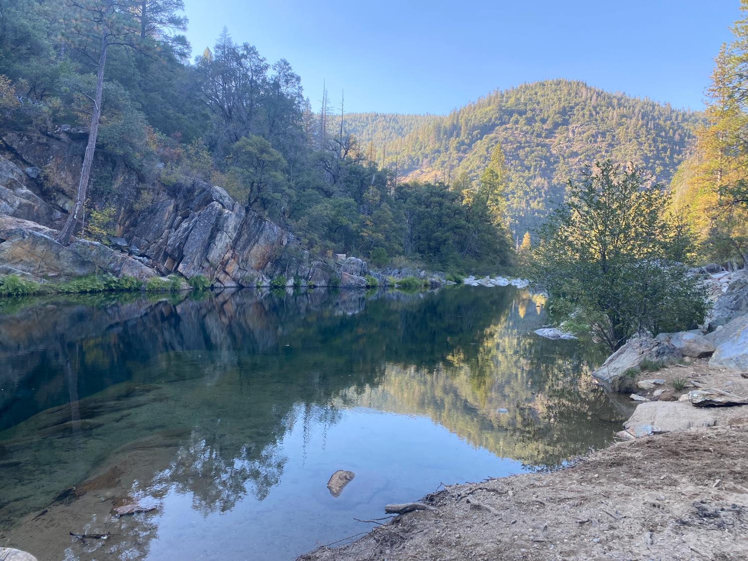 31004 Relief Hill Road, Unit 3 Nevada City, CA 95959 - Photo 28 of 31 a view of a lake with a mountain in the background