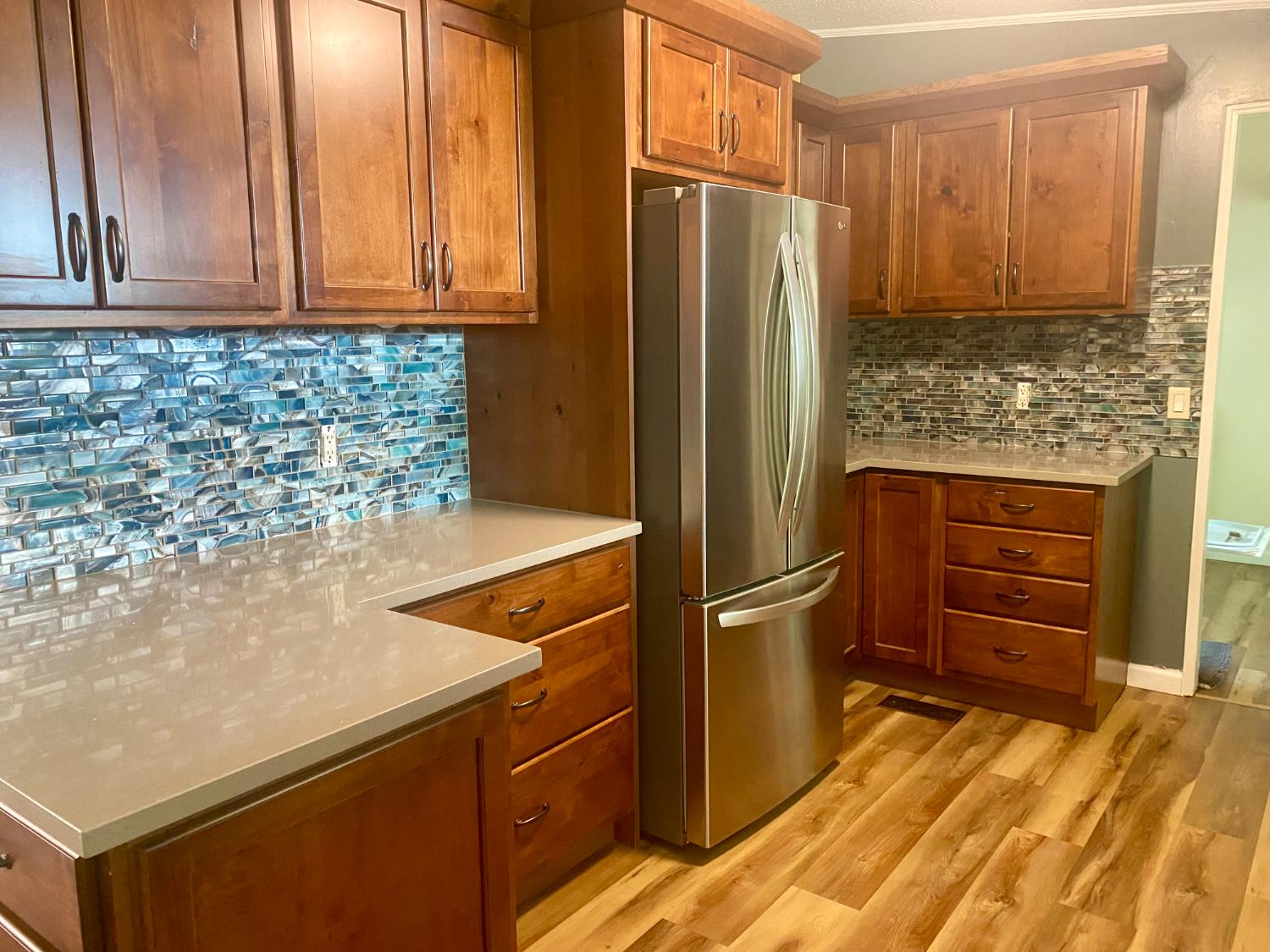 31004 Relief Hill Road, Unit 3 Nevada City, CA 95959 - Photo 7 of 31 a kitchen with stainless steel appliances granite countertop a refrigerator and a stove