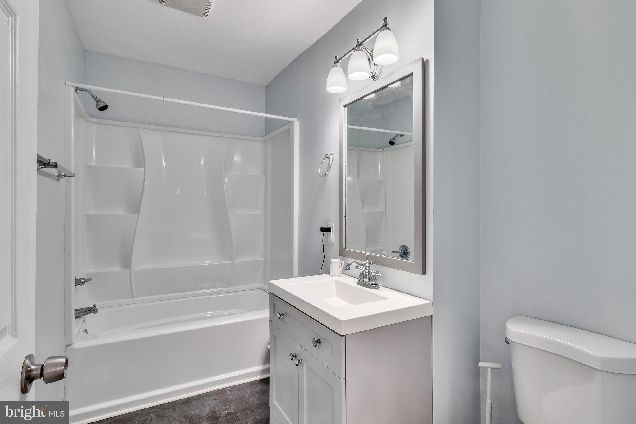 9832 River Road Lancaster, VA 22503 - Photo 22 of 68 Modern bathroom with sleek finishes.