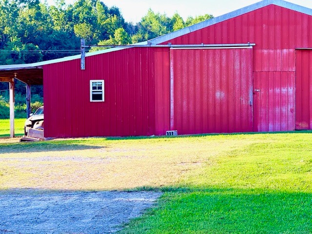 714 Howell Hill Road Flintville, TN 37335 - Photo 32 of 33 a view of a house with a backyard