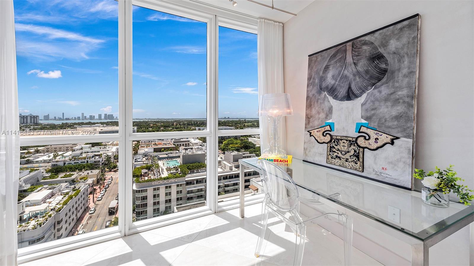 101 20th Street, Unit 2102 Miami Beach, FL 33139 - Photo 11 of 40 a view of a living room with a large window