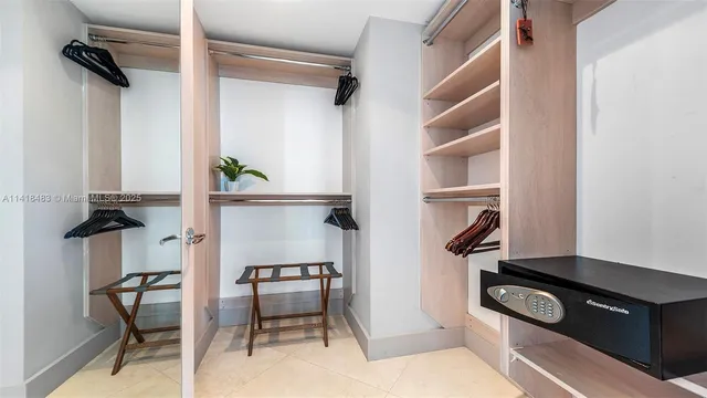 a kitchen with stainless steel appliances a stove and a refrigerator