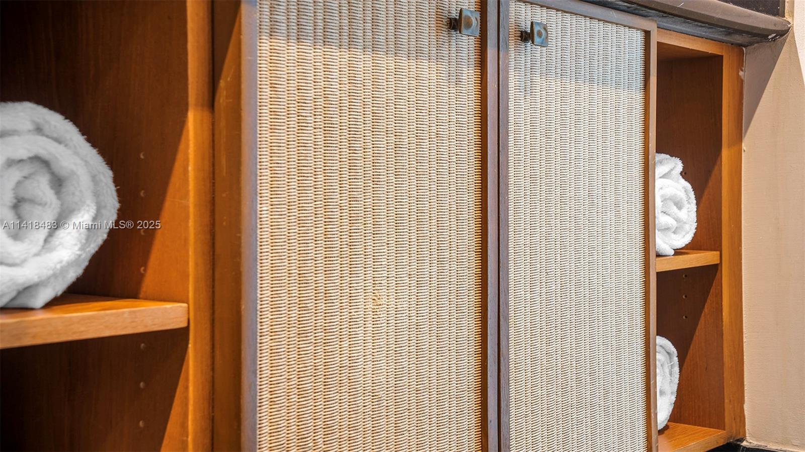 101 20th Street, Unit 2102 Miami Beach, FL 33139 - Photo 38 of 40 a bathroom with a sink and a mirror