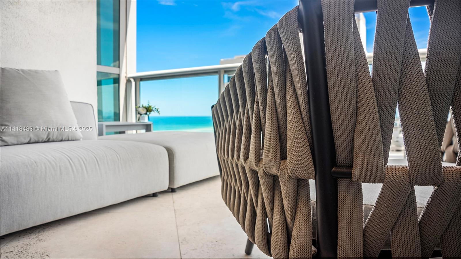 101 20th Street, Unit 2102 Miami Beach, FL 33139 - Photo 5 of 40 a bedroom with a bed and a mirror