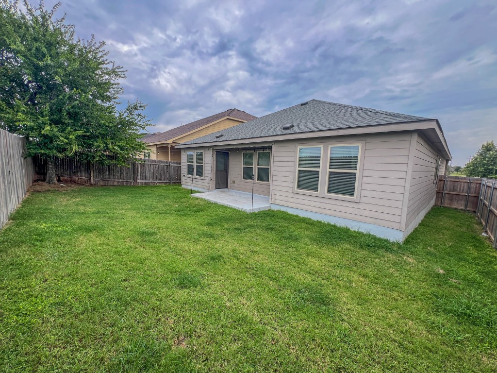 324 Druse Lane Jarrell, TX 76537 - Photo 29 of 29 a view of a house with a backyard