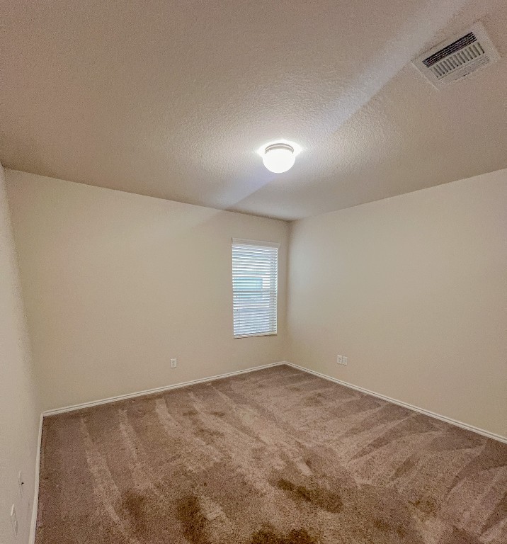 324 Druse Lane Jarrell, TX 76537 - Photo 10 of 29 a view of an empty room and a window