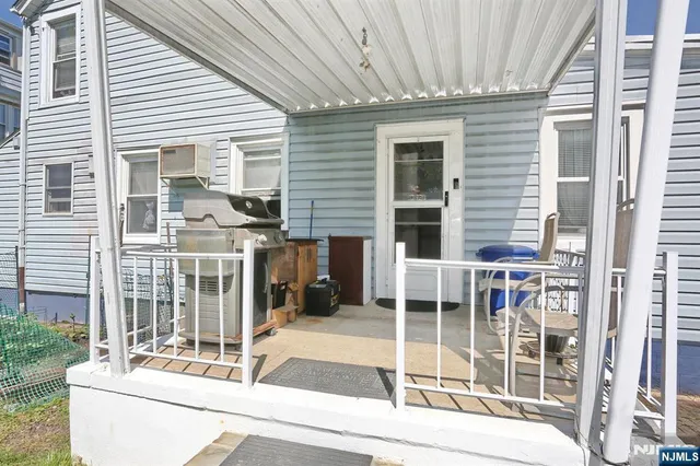 a view of a house with a large window