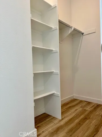 a view of an empty walk in closet