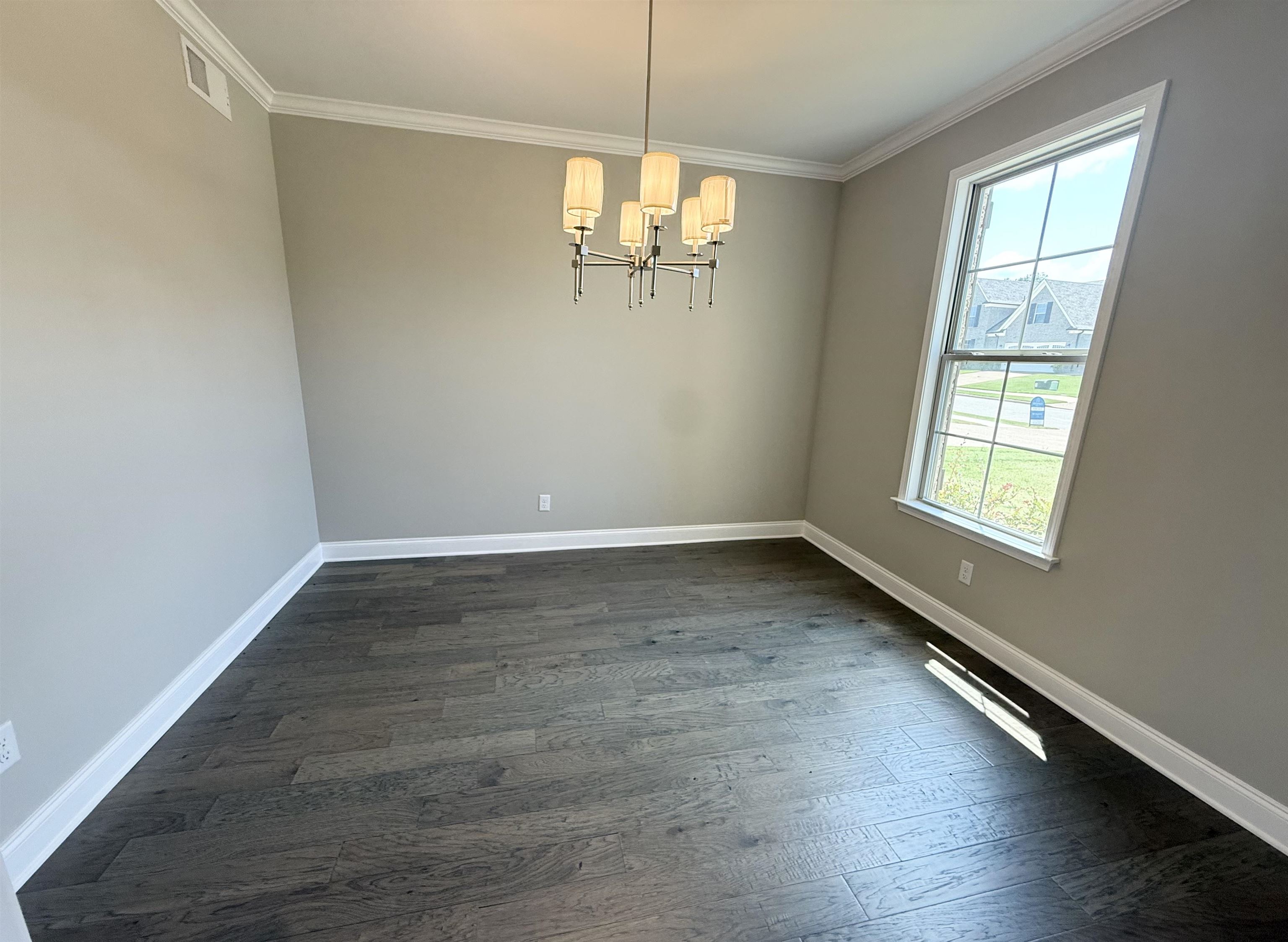 115 Misty Rdg Loop Oakland, TN 38060 - Photo 11 of 29 an empty room with wooden floor and windows