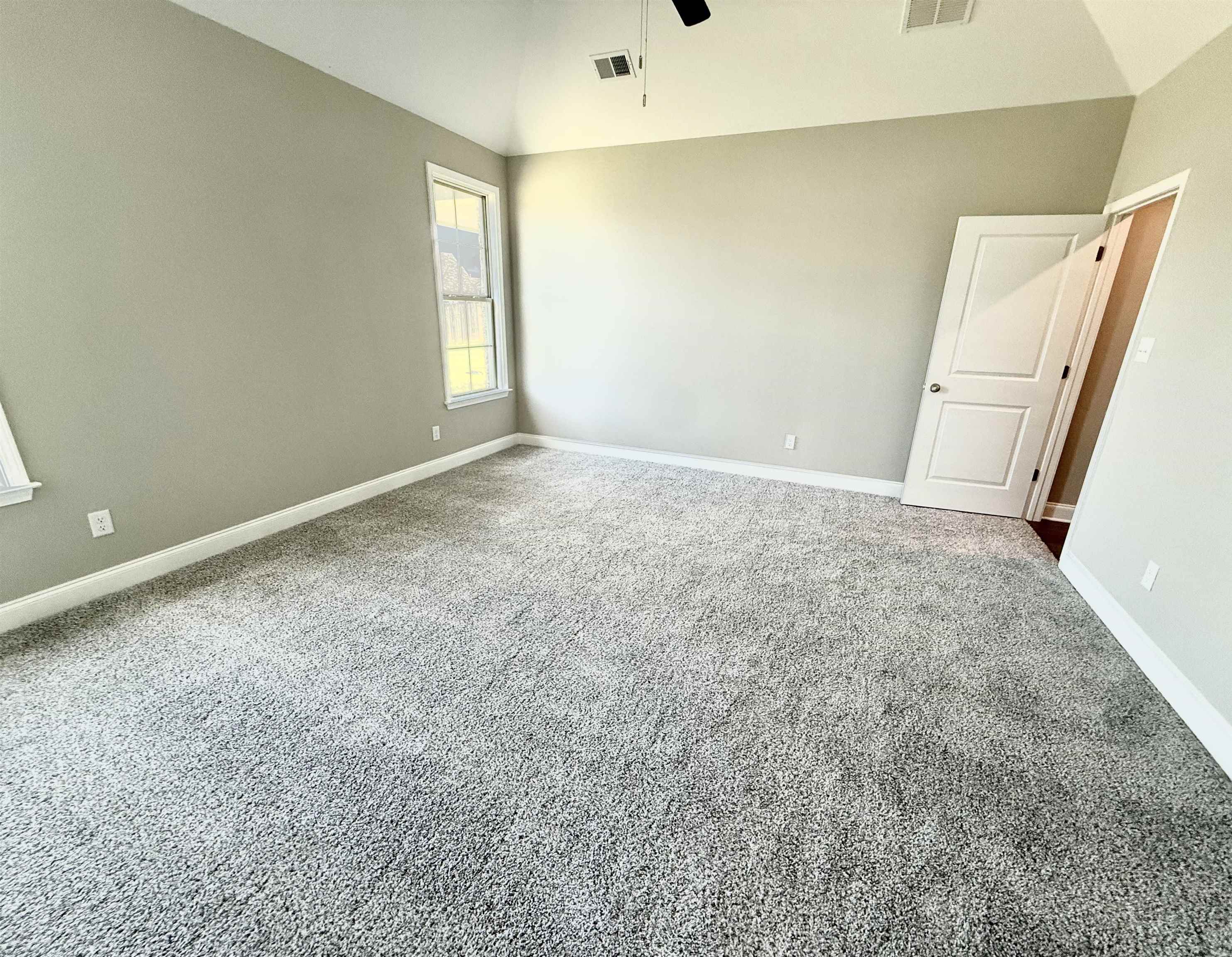 115 Misty Rdg Loop Oakland, TN 38060 - Photo 13 of 29 an empty room with windows and refrigerator