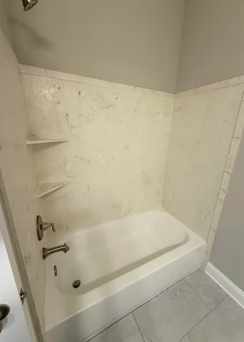 a bathroom with a bathtub