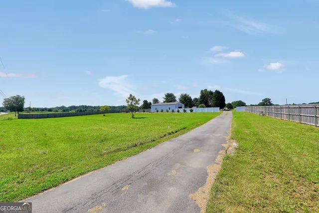a view of a golf course with a garden