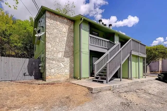 a view of a house with a staircase