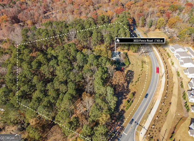 a view of a street with a building in the background