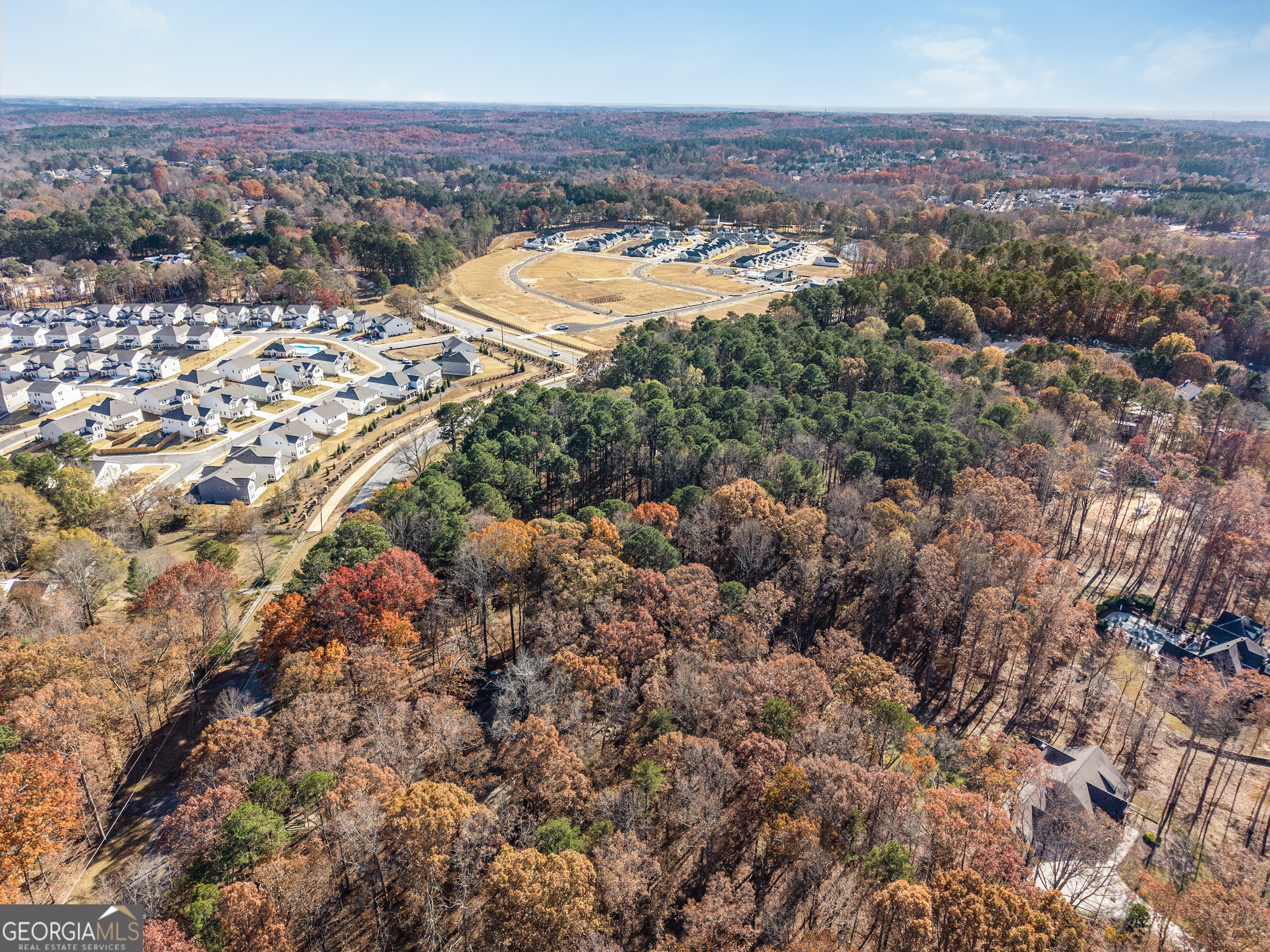 3033 Fence Road Northeast Dacula, GA 30019 - Photo 9 of 13 an aerial view of a house with a outdoor space
