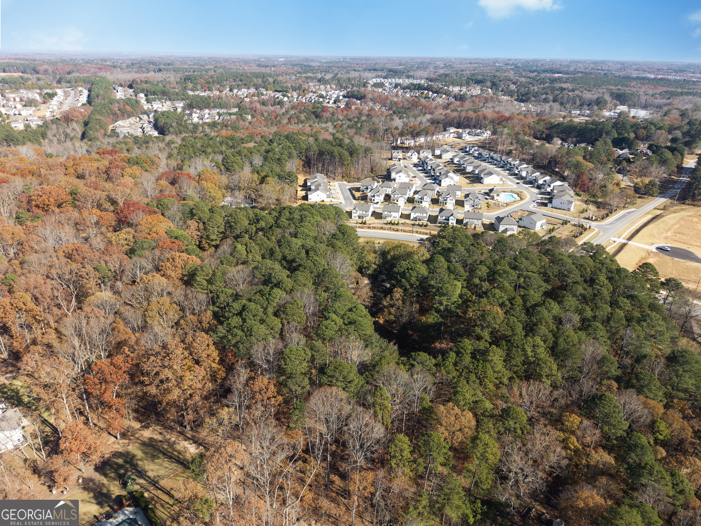 3033 Fence Road Northeast Dacula, GA 30019 - Photo 10 of 13 an aerial view of multiple house
