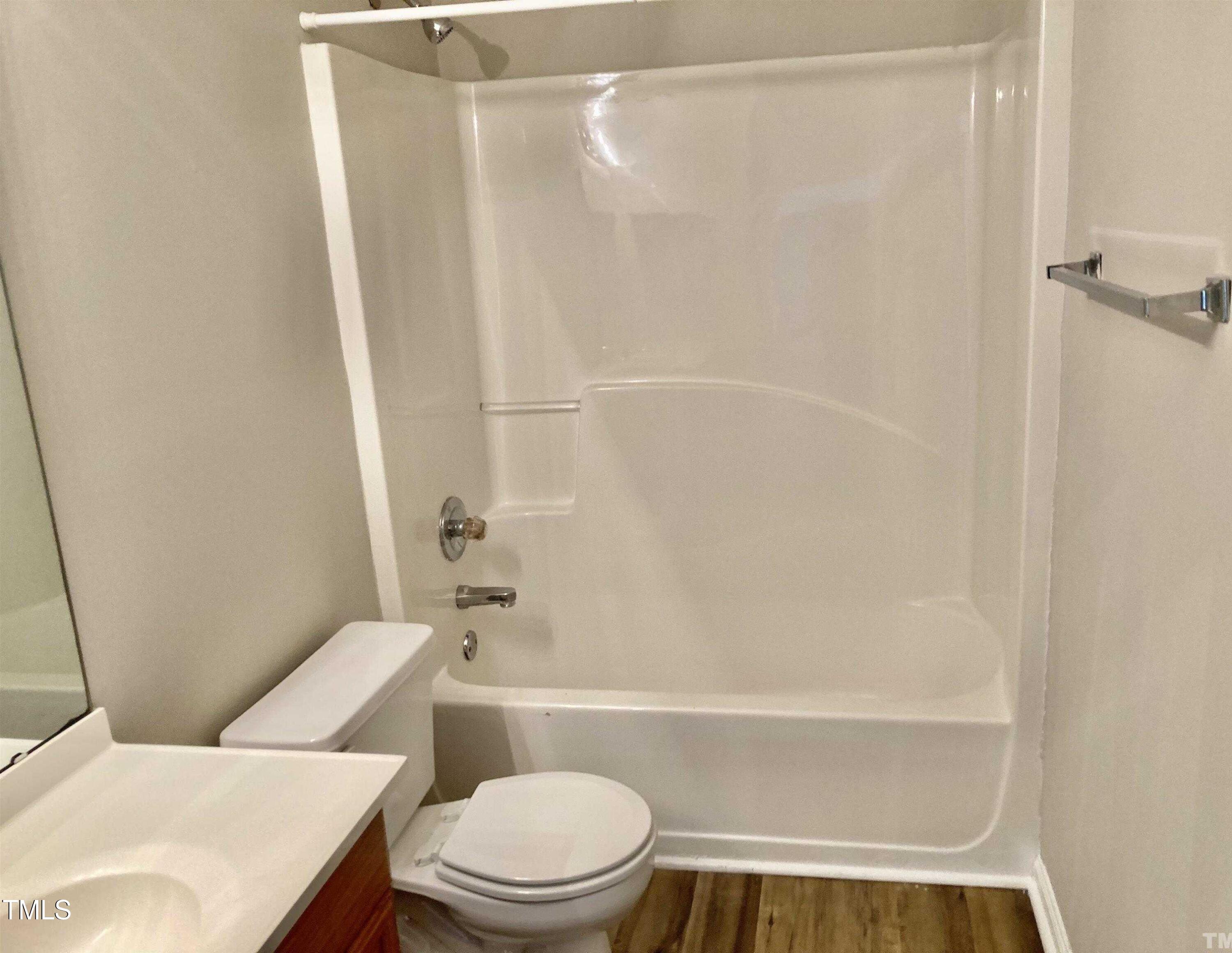 117 Mint Hill Drive Cary, NC 27519 - Photo 11 of 14 a bathroom with a toilet and a shower