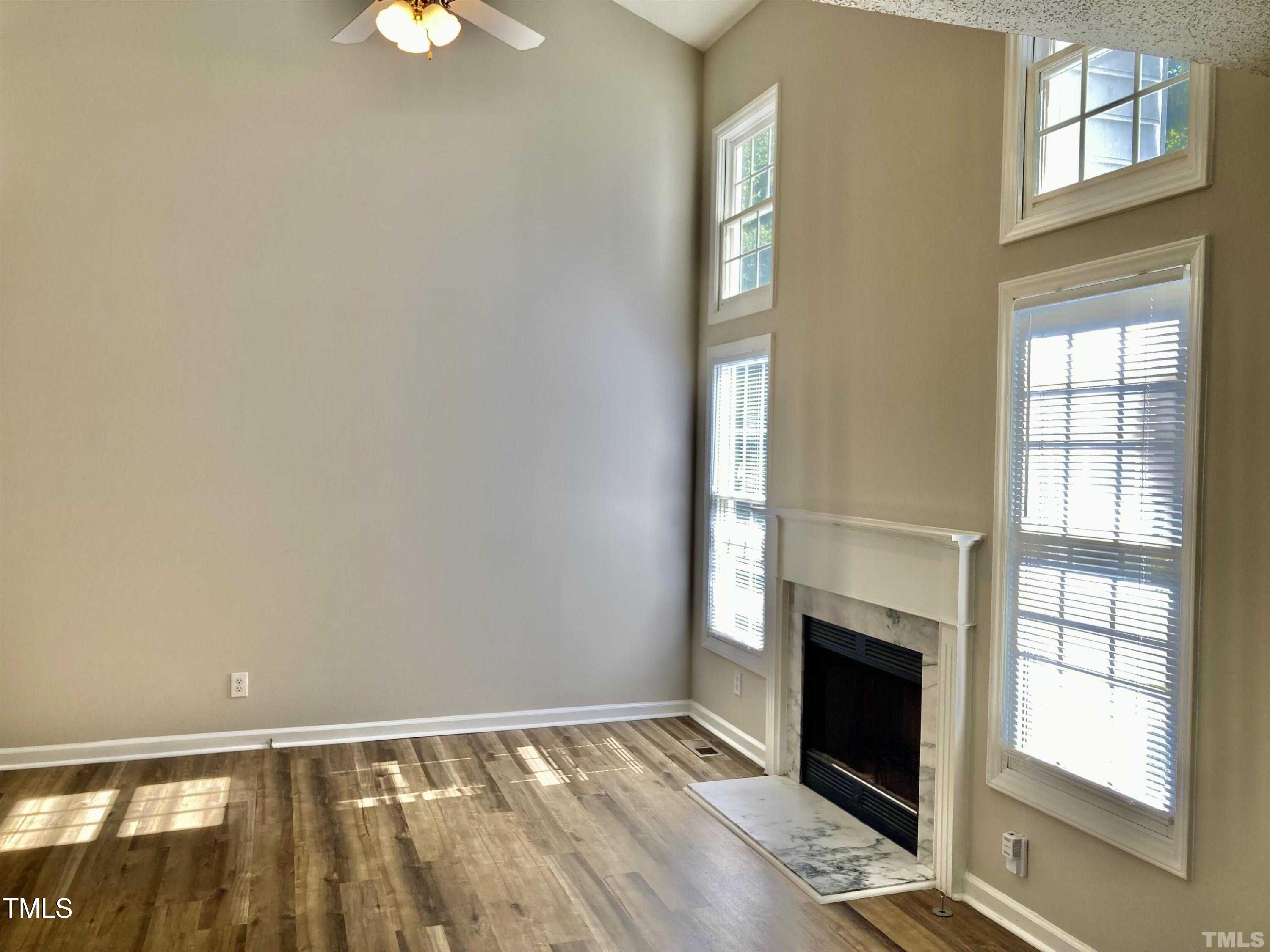 117 Mint Hill Drive Cary, NC 27519 - Photo 3 of 14 a view of an empty room and window