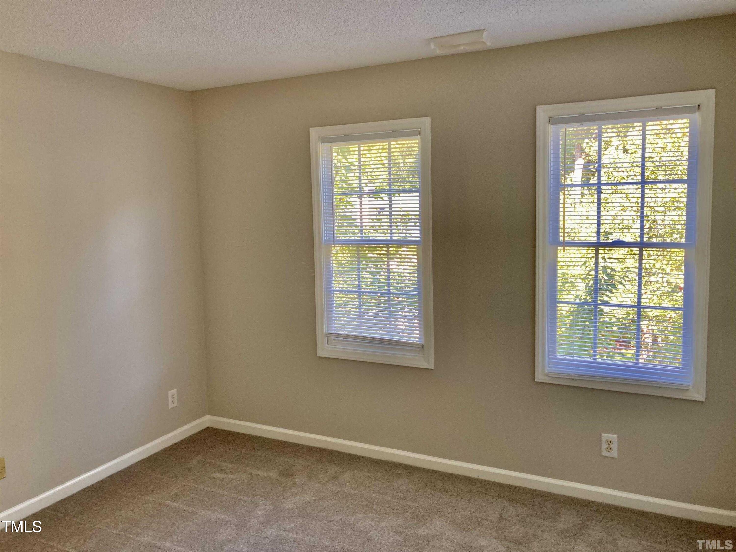 117 Mint Hill Drive Cary, NC 27519 - Photo 10 of 14 an empty room with a window
