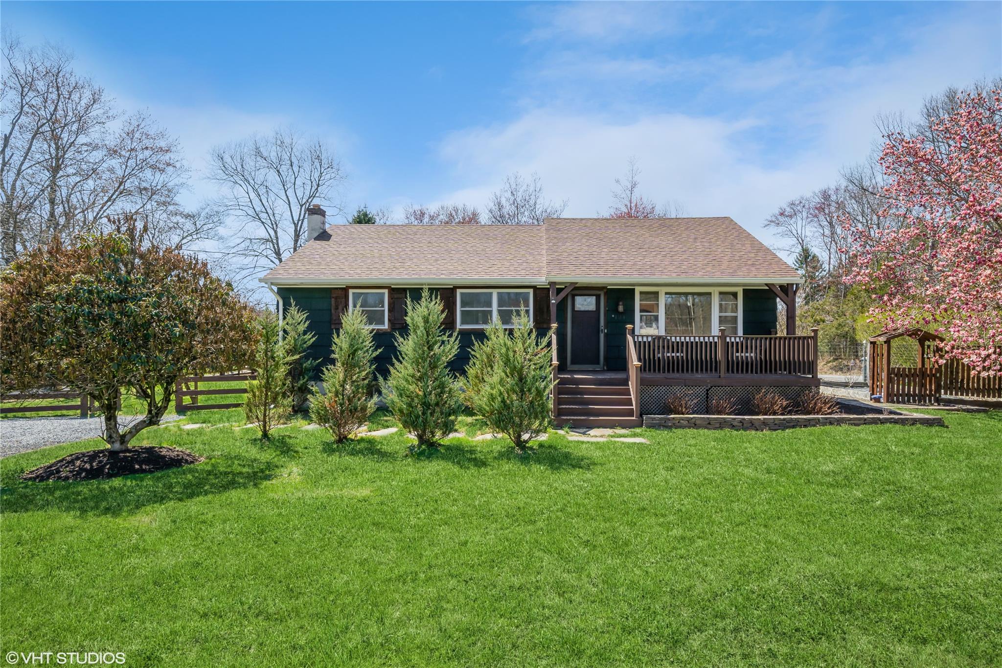 124 Glenmere Homesites Road Florida, NY 10921 - Photo 1 of 1 a front view of a house with a garden