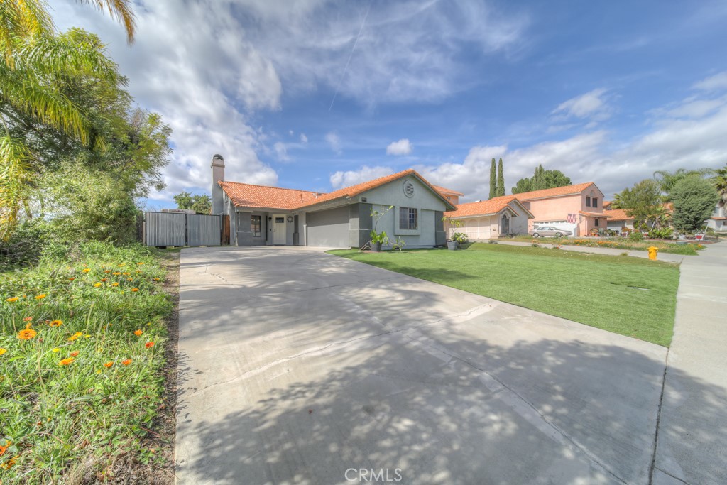 39885 Rustic Glen Drive Temecula, CA 92591 - Photo 1 of 1 a front view of a house with a yard