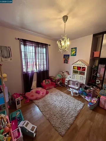 a room with gym equipment and a window