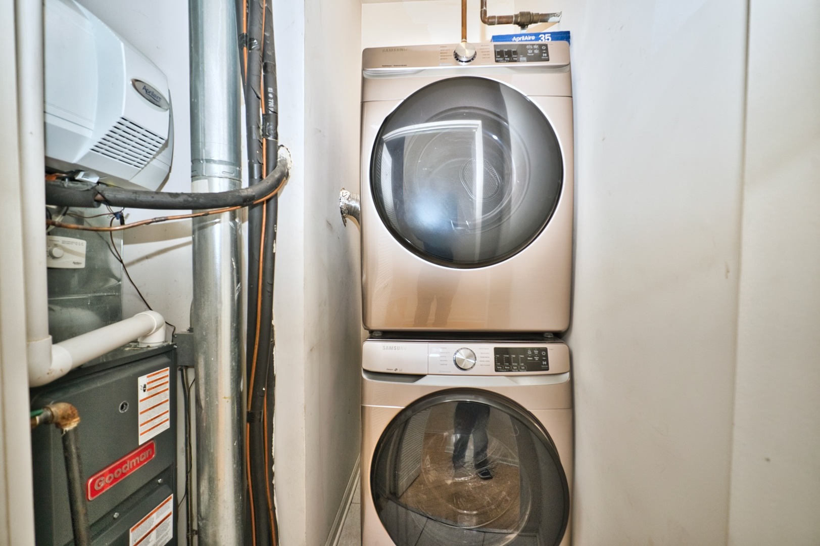 2317 West Wolfram Street, Unit 515 Chicago, IL 60618 - Photo 17 of 35 a close up view of a washer and dryer