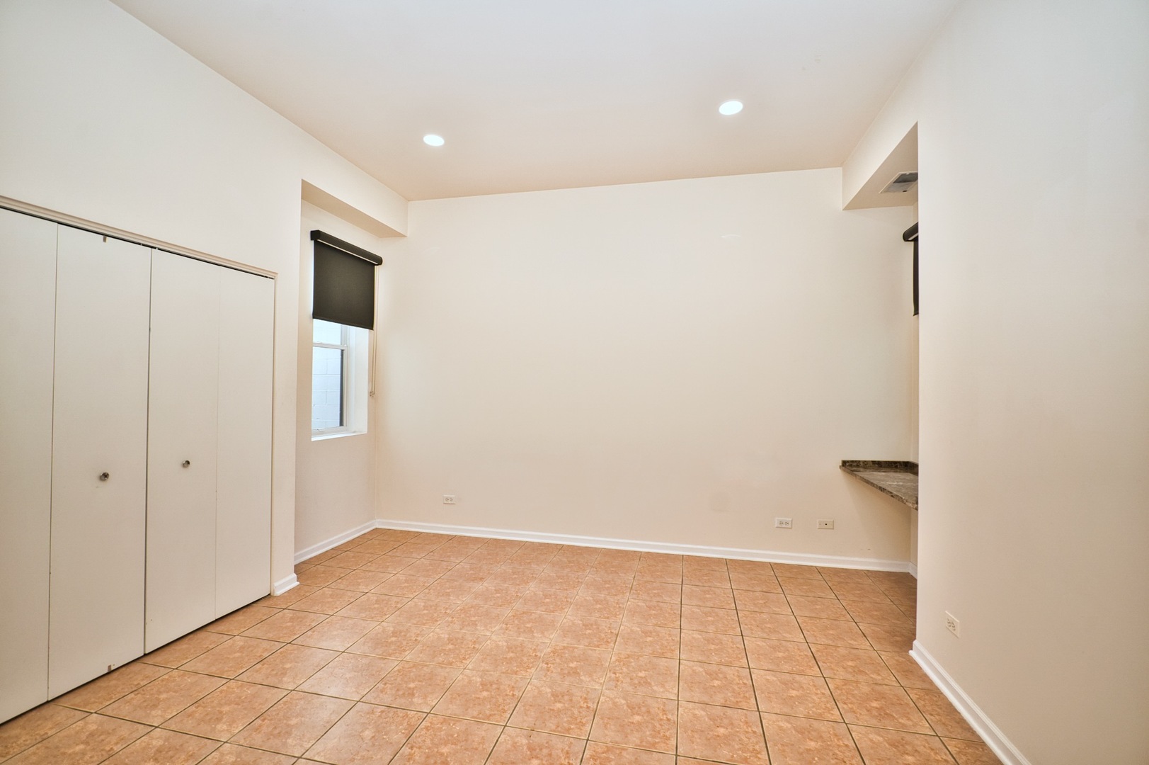 2317 West Wolfram Street, Unit 515 Chicago, IL 60618 - Photo 27 of 35 a view of an empty room