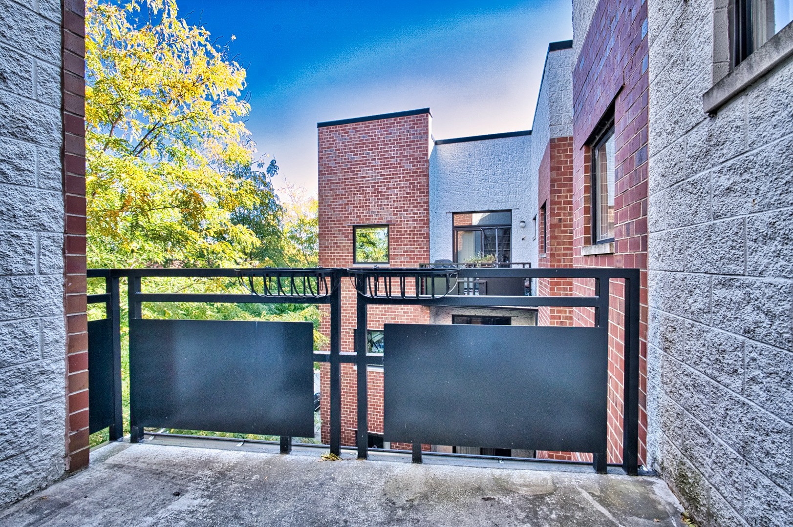2317 West Wolfram Street, Unit 515 Chicago, IL 60618 - Photo 33 of 35 a front view of a house with plants