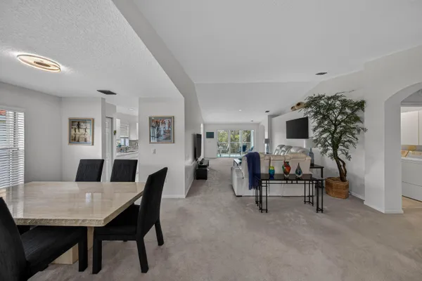 a view of a livingroom with furniture and window