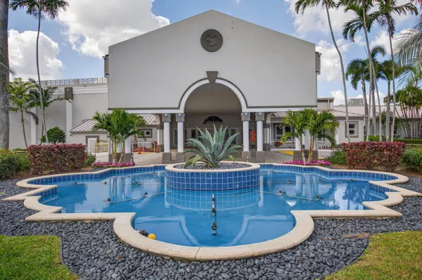 a view of swimming pool from a outdoor space
