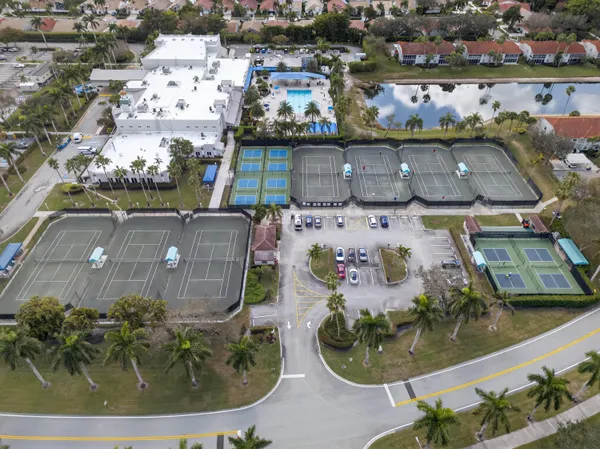 an aerial view of a house with outdoor space