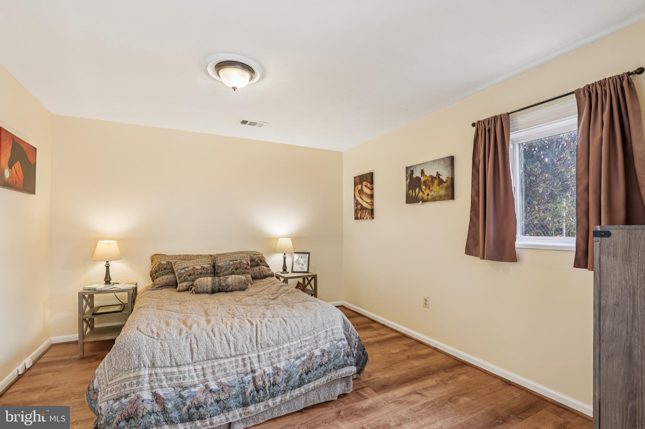 617 Denham Road Rockville, MD 20851 - Photo 21 of 31 Cozy bedroom with warm, inviting tones.